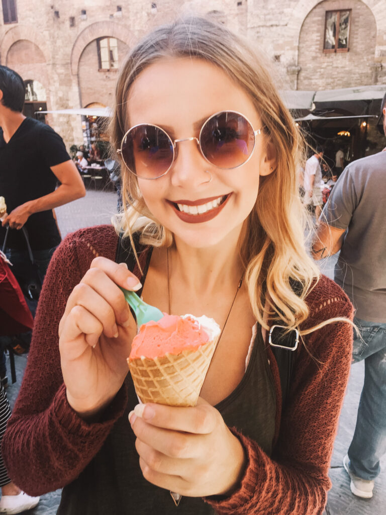 Girl eating gelato in Italy