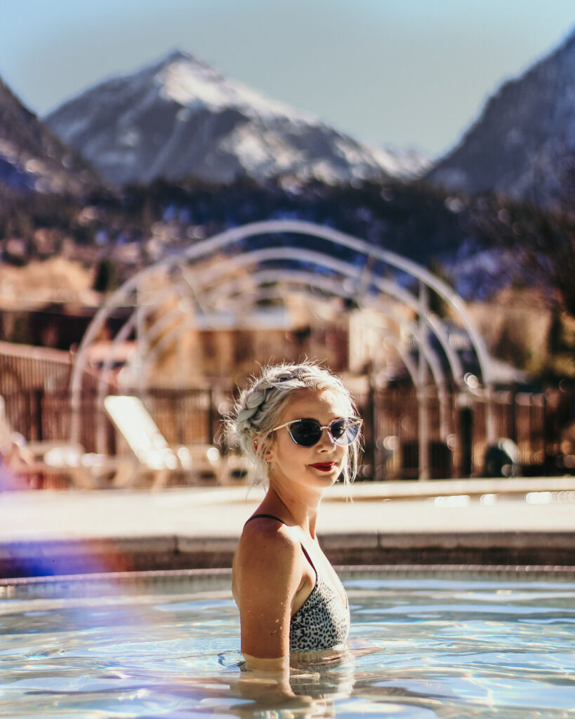 Girl soaking in the Ouray hot springs in Colorado. 