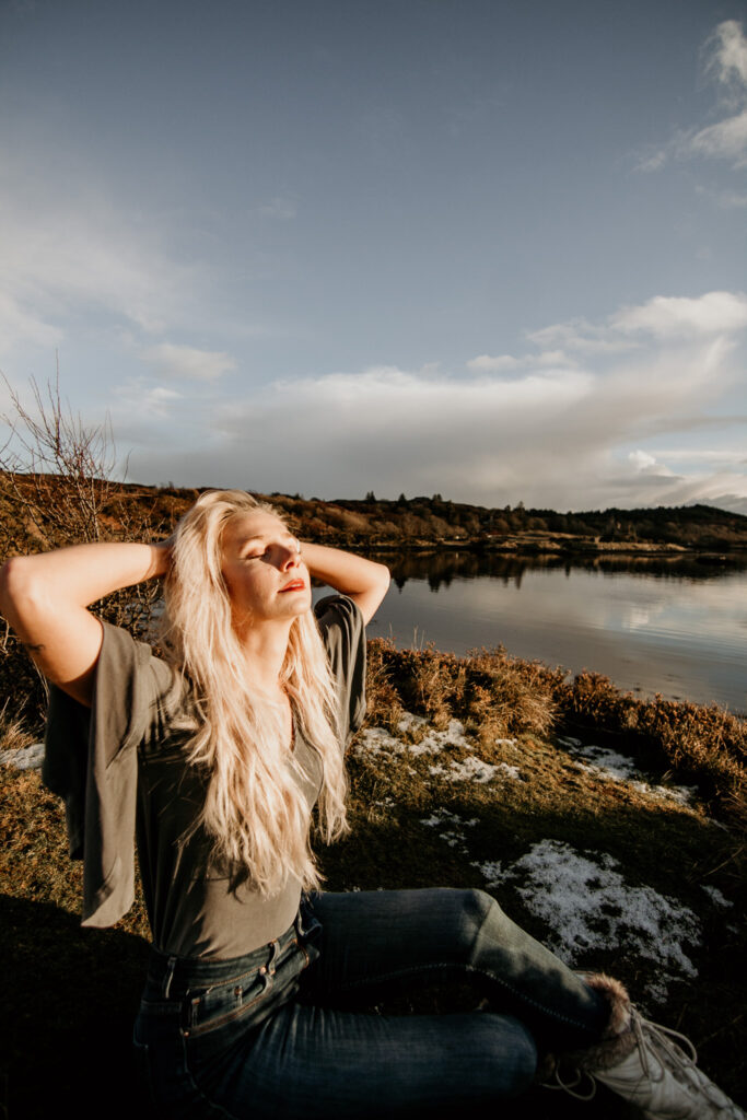 Girl taking in the nature in Isle of Skye, Scotland 
